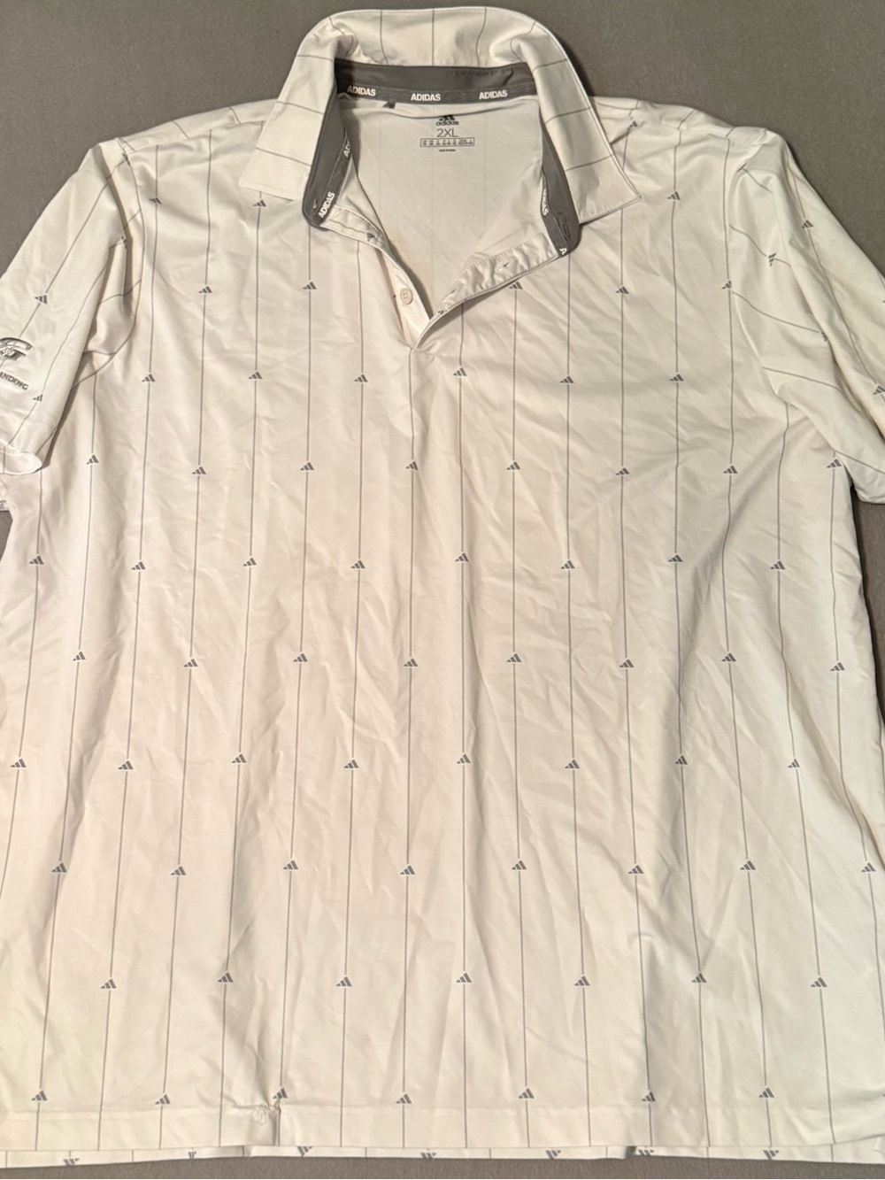 Adidas White Short-Sleeve Golf Polo with Subtle Logo Pinstripes